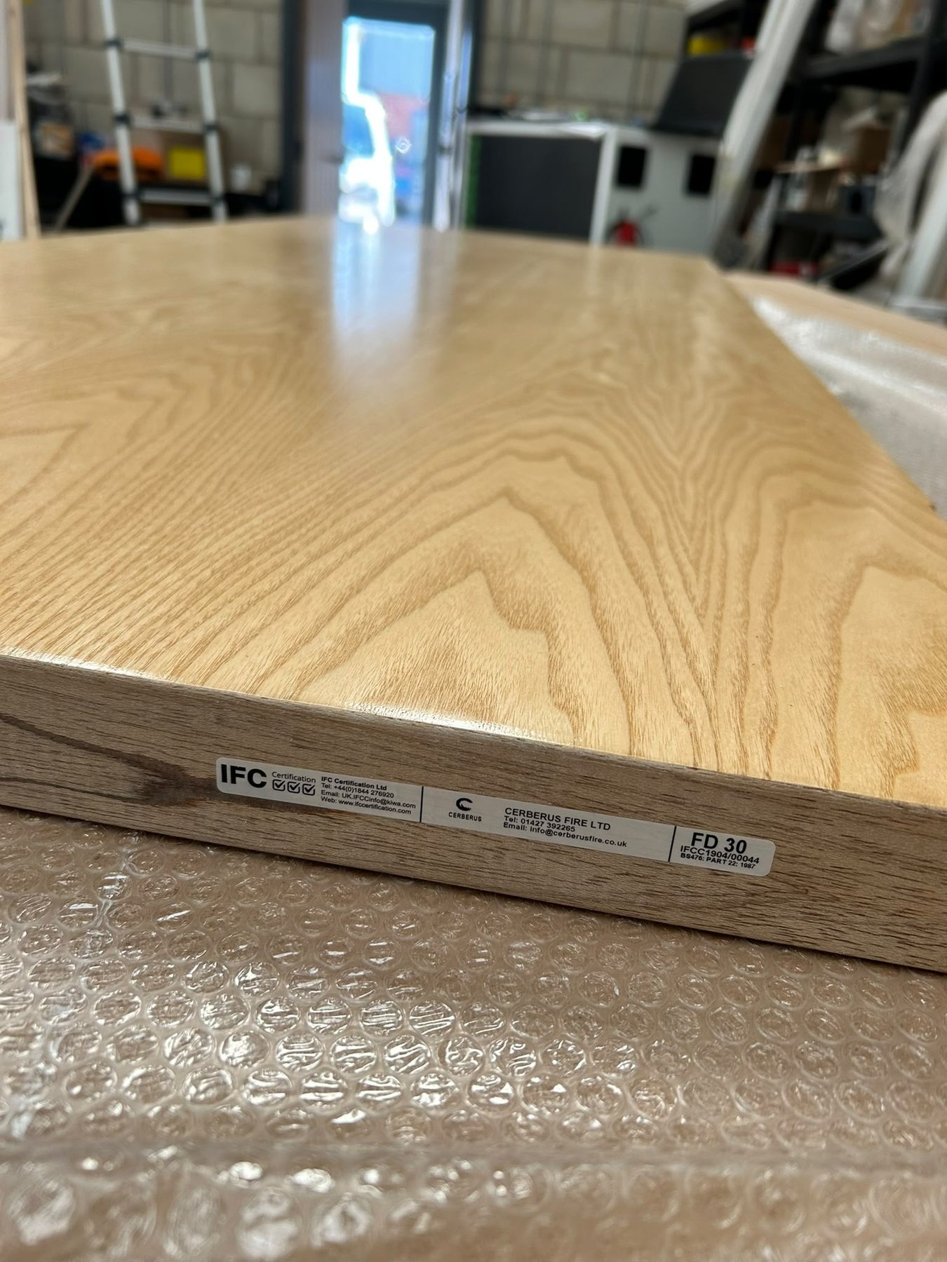 Certification and traceability label fitted to a Cerberus manufactured fire door